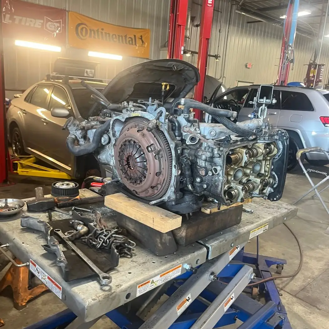 An engine on the bench in the Fogg's service shop